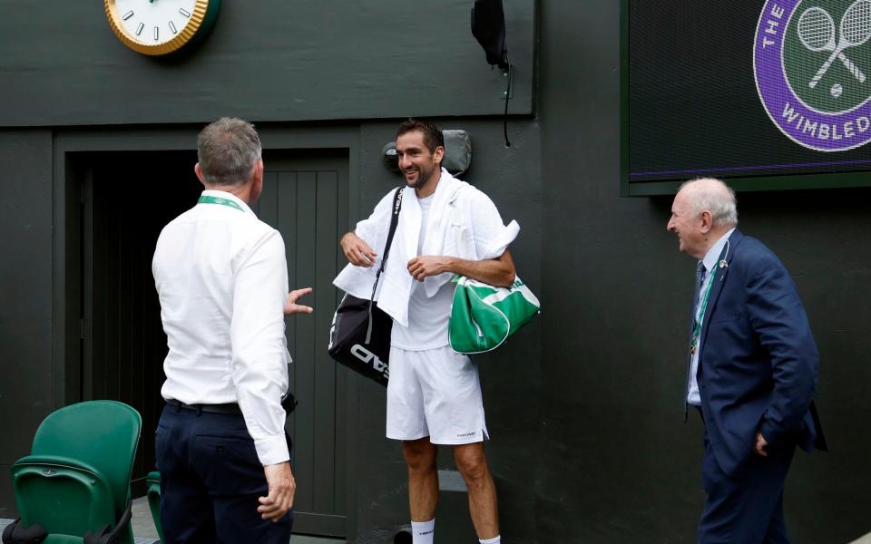 Marin Cilic tests positive for Covid after practising with Novak Djokovic at Wimbledon - PA