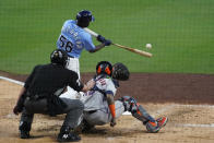 Tampa Bay Rays Randy Arozarena hits a solo home run against Houston Astros starting pitcher Framber Valdez during the fourth inning in Game 1 of a baseball American League Championship Series, Sunday, Oct. 11, 2020, in San Diego. (AP Photo/Ashley Landis)
