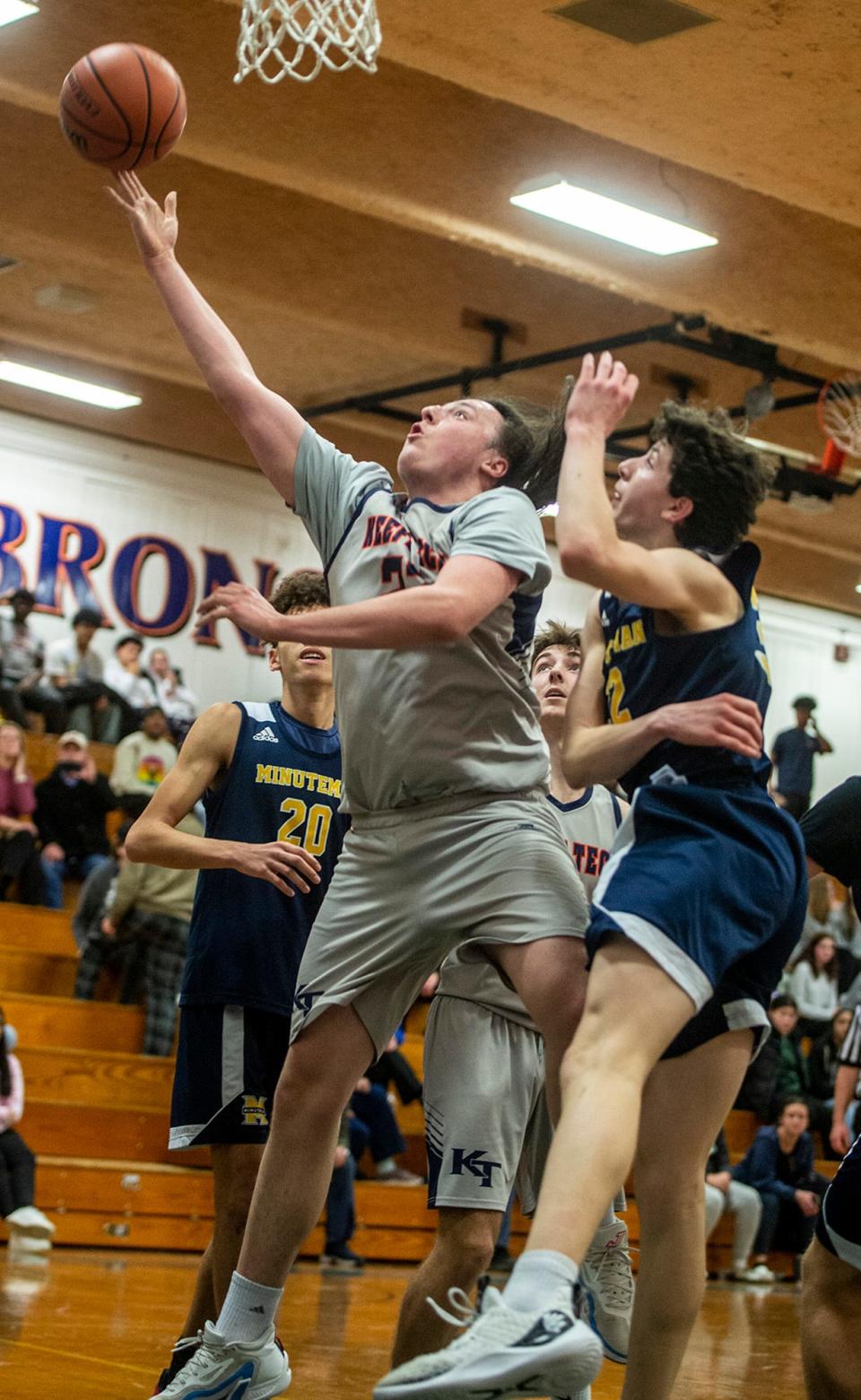 Keefe Tech junior captain Logan Greenlaw with a layup against Minuteman Tech in the home opener, Dec. 14, 2023. The Broncos won, 68-38.