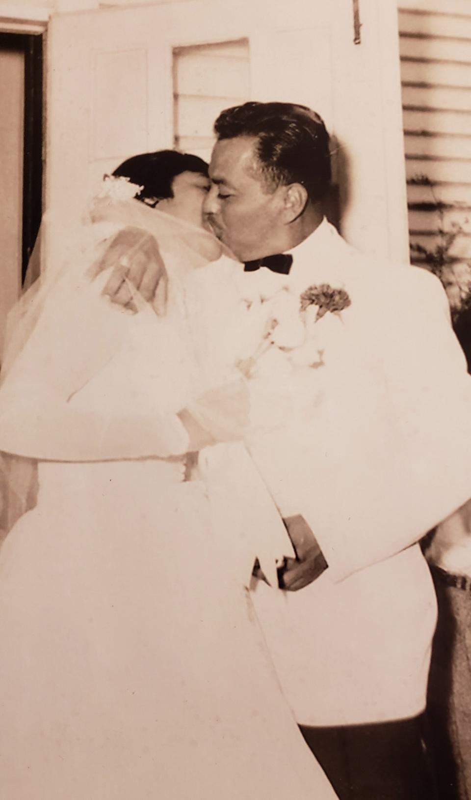 "This is a photo of my grandparents, Jos&eacute; and Jessie Garibay, on their wedding day in 1954. My grandma was in nursing school when she met my grandpa, a soldier at a nearby base who endlessly pursued her. They were married 49 years and have two sons, four grandchildren and four great-grandchildren." ― <i>J. Headle</i>