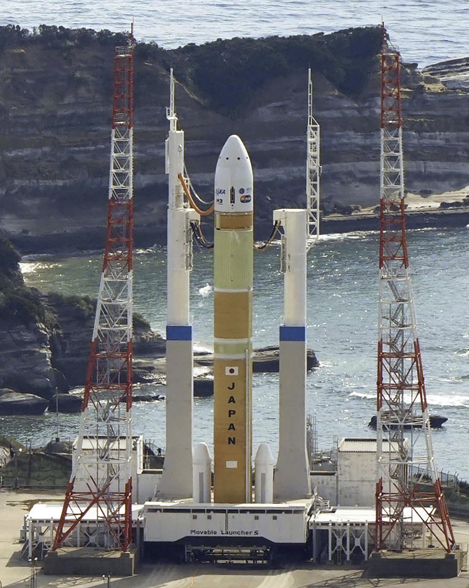 An H3 rocket sits on the launch pad after a planned launch at Tanegashima Space Center in Kagoshima, southern Japan Friday, Feb. 17, 2023. Japan’s space agency aborted a planned launch Friday of the first of its new flagship series H3 rocket. (Kyodo News via AP)