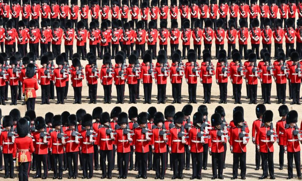 Members of the Household Division take part in trooping the colour