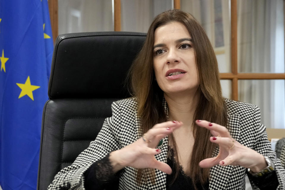 Cyprus Energy Minister Natasa Pilides gestures during an interview with The Associated Press at the Energy ministry in the capital Nicosia, Cyprus, Monday, Dec. 19, 2022. (AP Photo/Petros Karadjias)