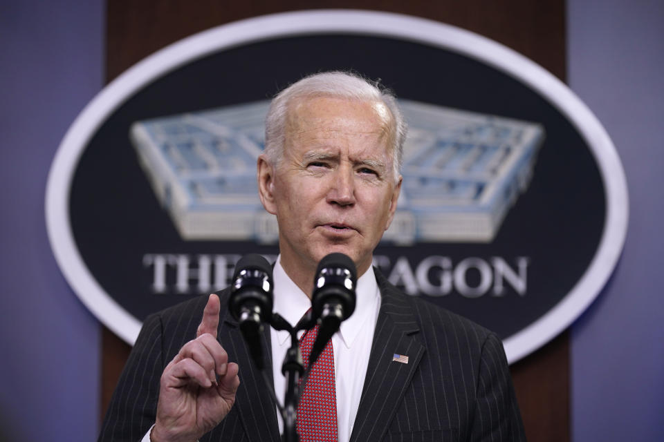 President Joe Biden speaks to Department of Defense personnel alongside Vice President Kamala Harris and Defense Secretary Lloyd Austin at the Pentagon, Wednesday, Feb. 10, 2021, in Washington. (AP Photo/Patrick Semansky)