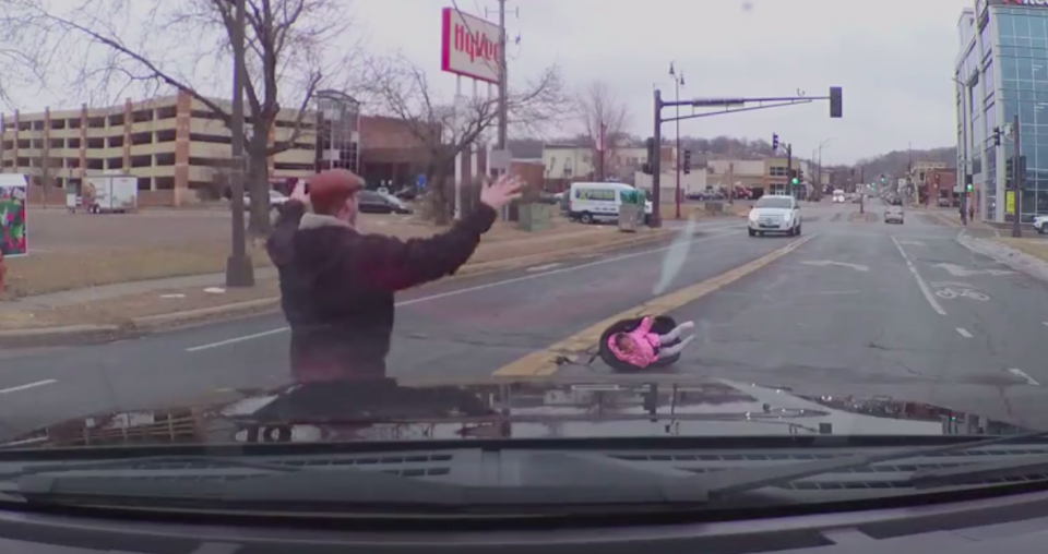 Mr Mock tried in vain to flag down the car which the child had fallen from. Source: Storyful/ Chad Mock