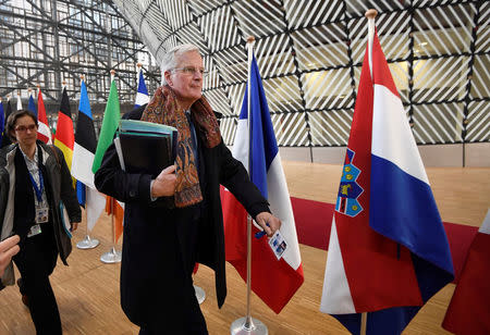 FILE PHOTO: EU Brexit negotiator Michel Barnier arrives at the EU summit in Brussels, Belgium, March 9, 2017. REUTERS/Dylan Martinez/File Photo