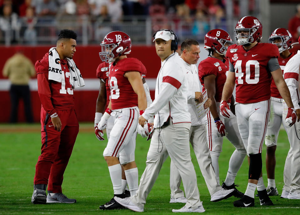 TUSCALOOSA, ALABAMA - OCTOBER 26:  Tua Tagovailoa #13 of the Alabama Crimson Tide stands out on the field with the offense during a timeout in the game against the Arkansas Razorbacks at Bryant-Denny Stadium on October 26, 2019 in Tuscaloosa, Alabama. (Photo by Kevin C. Cox/Getty Images)