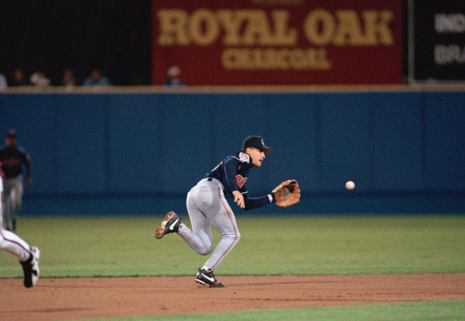 Cleveland shortstop Omar Vizquel reaches for a grounder in Game Six of the World Series on Oct. 28, 1995, in Atlanta, Ga.