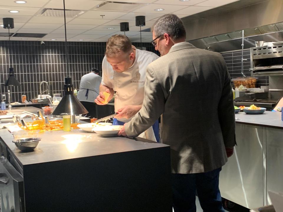 A view of Looking Glass CEO Scott Schmidt and Chef Mark Bodenstein from the chef's table at Alara restaurant, in Madisonville.