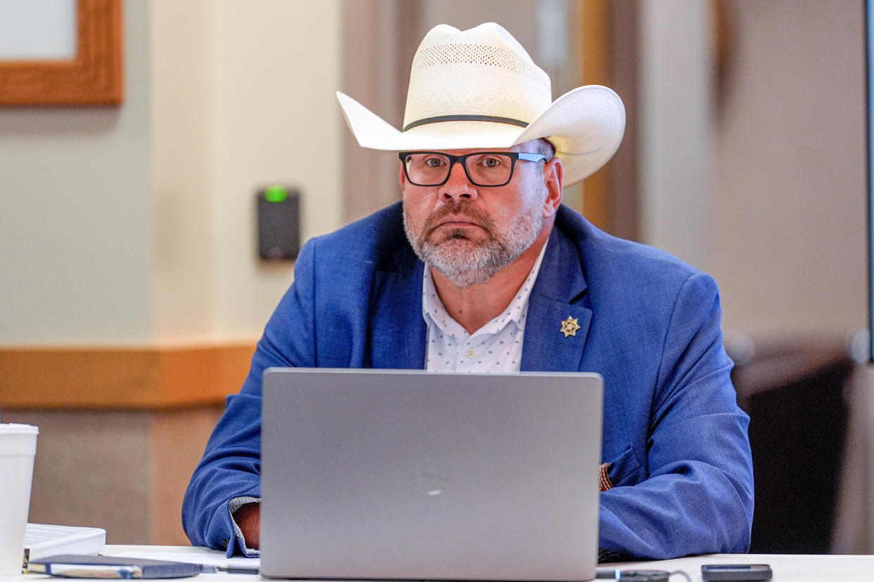 Sheriff Chris Amason presents a budget during a June 17 meeting at the Cleveland County Office Building in Norman.