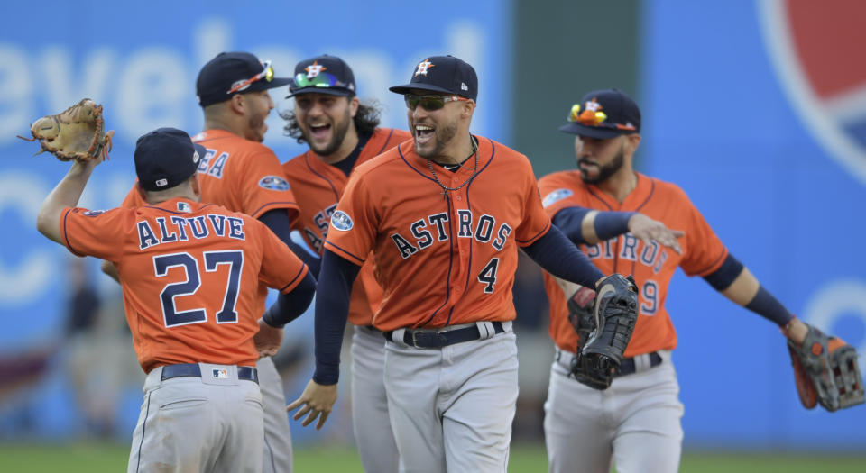 Houston Astros’ George Springer (4) and teammates celebrate after defeating the Cleveland Indians in Game 3 of a baseball American League Division Series, Monday, Oct. 8, 2018, in Cleveland. (AP)