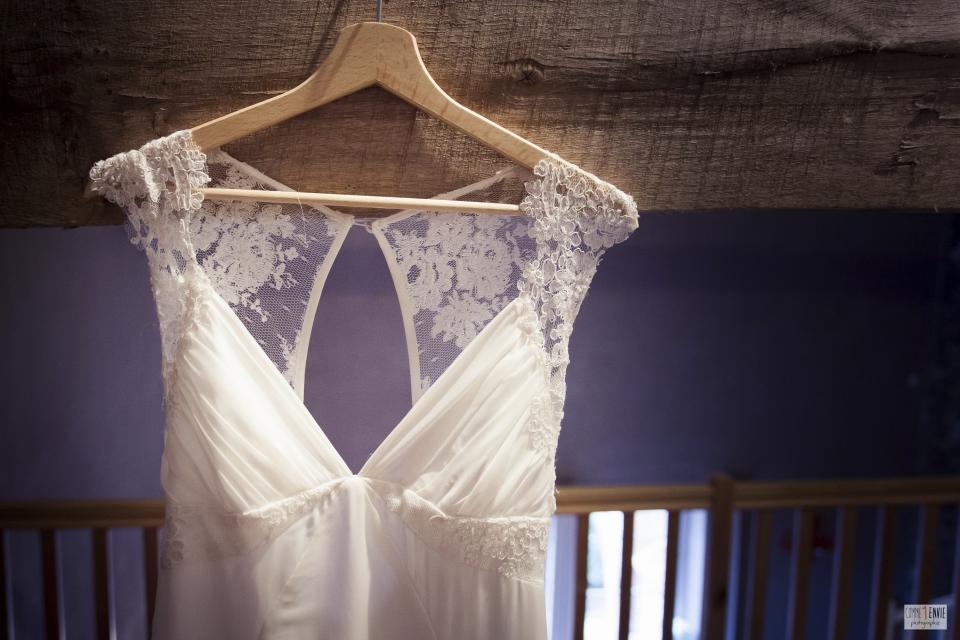 This photo provided by Laetitia Drouet, of France-based Kamelion Couture, shows a wedding dress created by her which was inspired by the Bea Johnson book "Zero Waste Home." The dress was made with pieces of fabric scraps that were destined for the trash. As environmental awareness grows, many couples are saying "I do" to Zero-Waste weddings. They're trying to cut back on trash _ everything from floral design and dresses to invitations and food.(comme1envie/Kamelion Couture via AP)