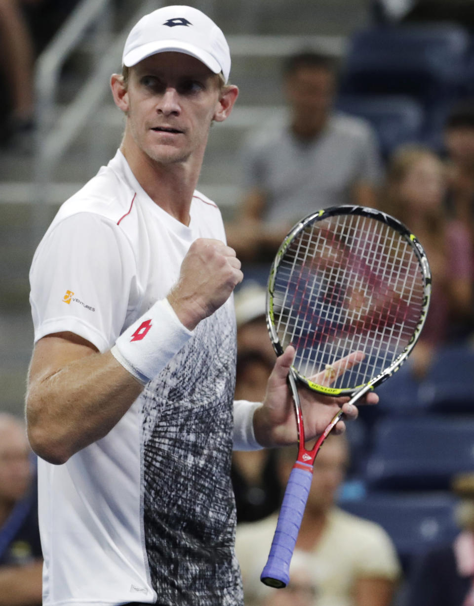 Kevin Anderson, of South Africa, reacts after winning a game against Denis Shapovalov, of Canada, during the third round of the U.S. Open tennis tournament, Friday, Aug. 31, 2018, in New York. (AP Photo/Julio Cortez)