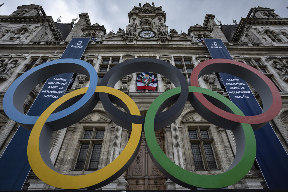 FILE - The Olympic rings in front of the Paris City Hall, in Paris, Sunday, April 30, 2023. France’s military is planning to contribute 15,000 soldiers to the massive security operation for next year's Paris Olympics, it was reported on Thursday, Nov. 23, 2023. (AP Photo/Aurelien Morissard, File)