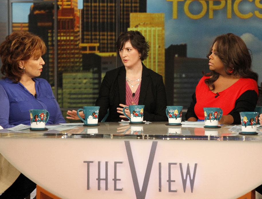 Georgetown University law student and activist Sandra Fluke, center, speaks as co-hosts Joy Behar, left, and Sherri Shepherd listen during an appearance on the daytime talk show, "The View," Monday, March 5, 2012 in New York. Fluke talked about conservative radio host Rush Limbaugh and the comments he made on his program after she testified to Democratic members of Congress in support of a requirement that health care companies provide coverage for contraception. Fluke told ABC's "The View" on Monday that she hasn't heard from Limbaugh since he issued a written apology late Saturday. (AP Photo/ABC, Lou Rocco)