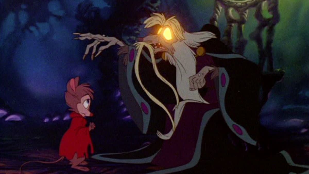 mrs brisby confronts a creature with glowing eyes in a scene from the secret of nimh, a good housekeeping pick for best scary halloween movie for kids