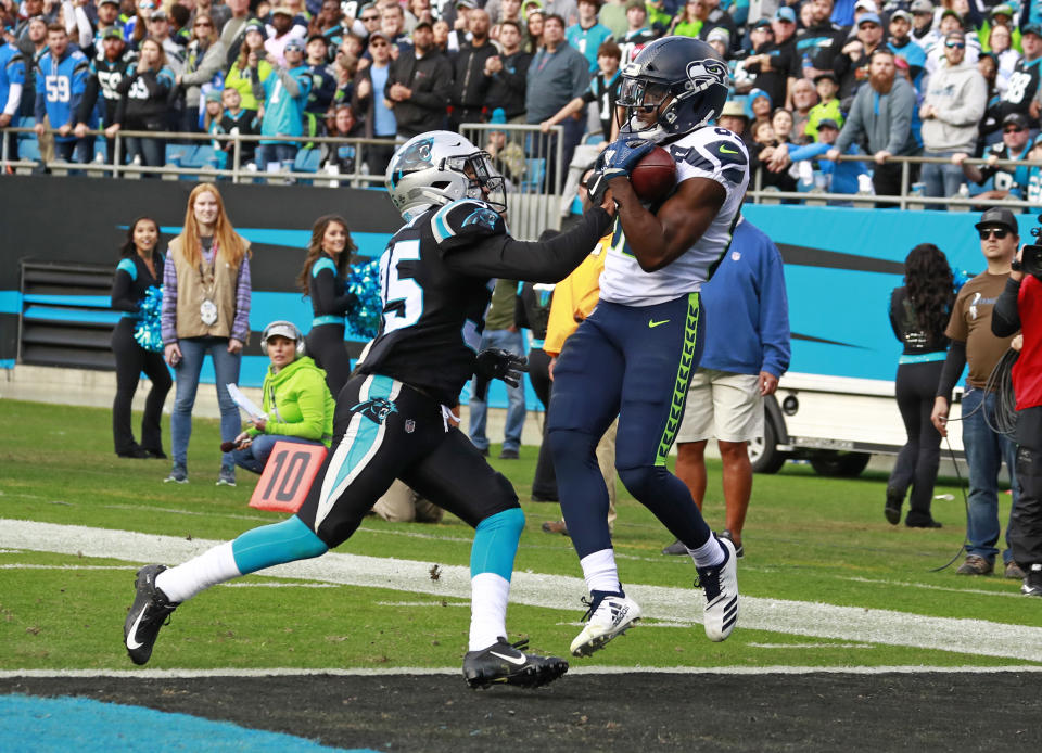 You’ll be pulling off winning performances like David Moore using our Week 13 content hub. (AP Photo/Jason E. Miczek)