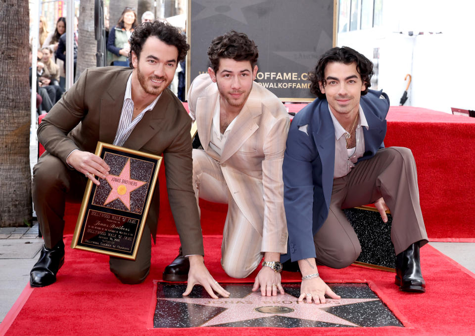 Kevin Jonas, Nick Jonas, and Joe Jonas of The Jonas Brothers attend The Hollywood Walk of Fame star ceremony honoring The Jonas Brothers. (Amy Sussman / Getty Images)