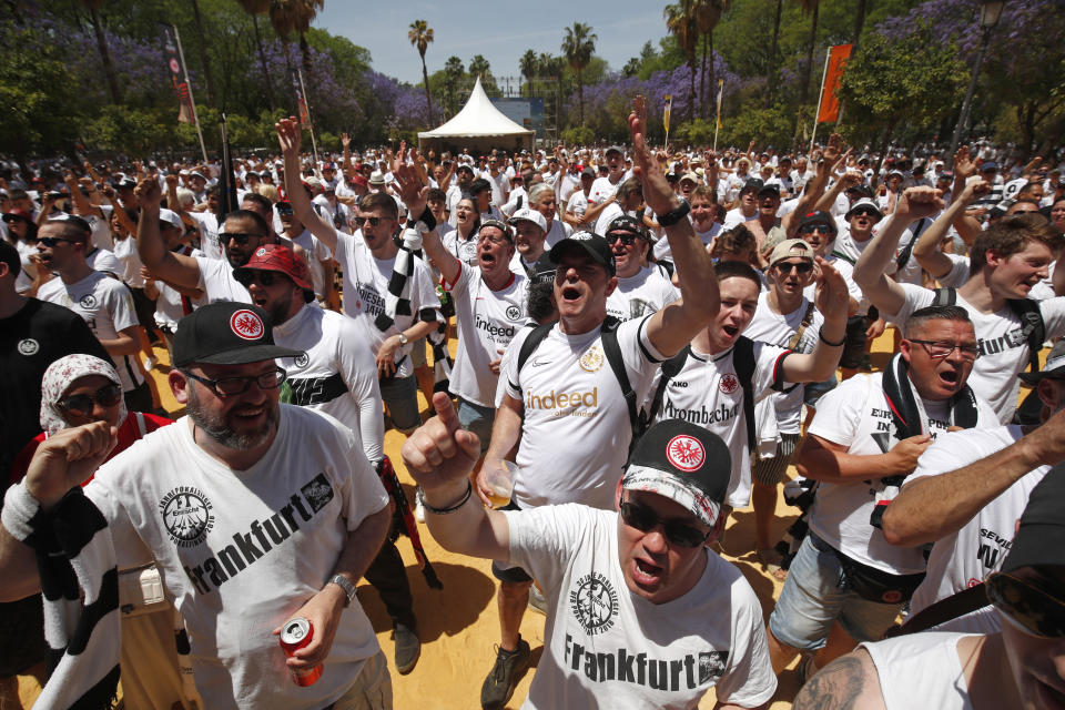 Eintracht supporters react in downtown Seville, Spain, Wednesday, May 18, 2022. Eintracht Frankfurt will play Glasgow Rangers in the Europa League final Wednesday evening in Seville. (AP Photo/Angel Fernandez)