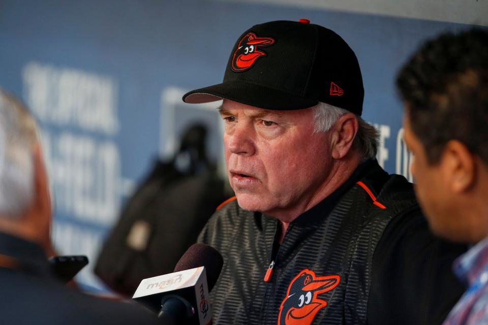 Baltimore Orioles manager Buck Showalter (26) answers questions during a dugout press conference before a game against the Seattle Mariners at Safeco Field on Aug 14, 2017.