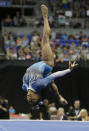 <p>Simone Biles competes in the floor exercise during the U.S. women’s gymnastics championships on June 26, 2016, in St. Louis. </p>