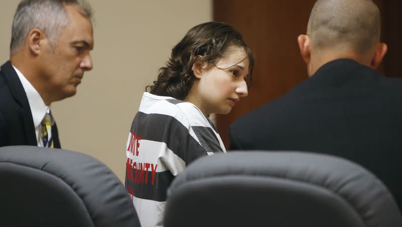 Gypsy Blanchard speaks with her attorneys Mike Stanfield, right, and Clate Baker before her court appearance in Springfield, Mo., on Tuesday, July 5, 2016.