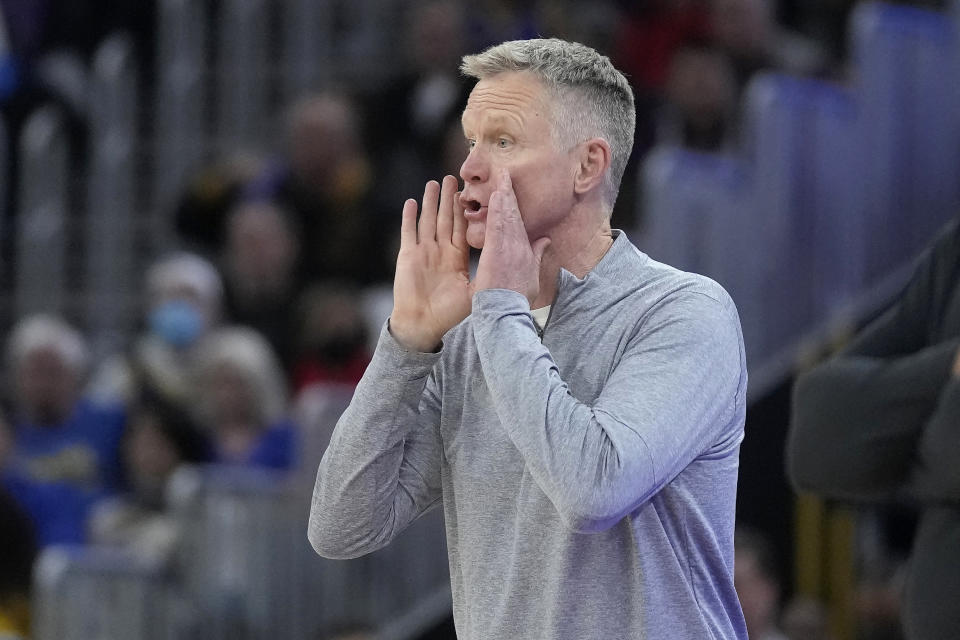 Golden State Warriors coach Steve Kerr shouts to players during the second half of the team's NBA basketball game against the Portland Trail Blazers in San Francisco, Saturday, Dec. 23, 2023. (AP Photo/Jeff Chiu)