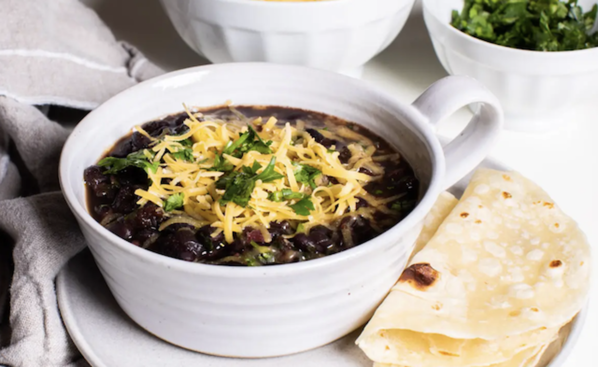 <p>The Magical Slow Cooker</p><p>Black beans are super healthy so this dish is loaded with great nutrients! </p><p><strong>Get the Recipe: <a href="https://www.themagicalslowcooker.com/slow-cooker-black-bean-soup/" rel="nofollow noopener" target="_blank" data-ylk="slk:Crock Pot Black Bean Soup;elm:context_link;itc:0;sec:content-canvas" class="link rapid-noclick-resp">Crock Pot Black Bean Soup</a></strong></p>