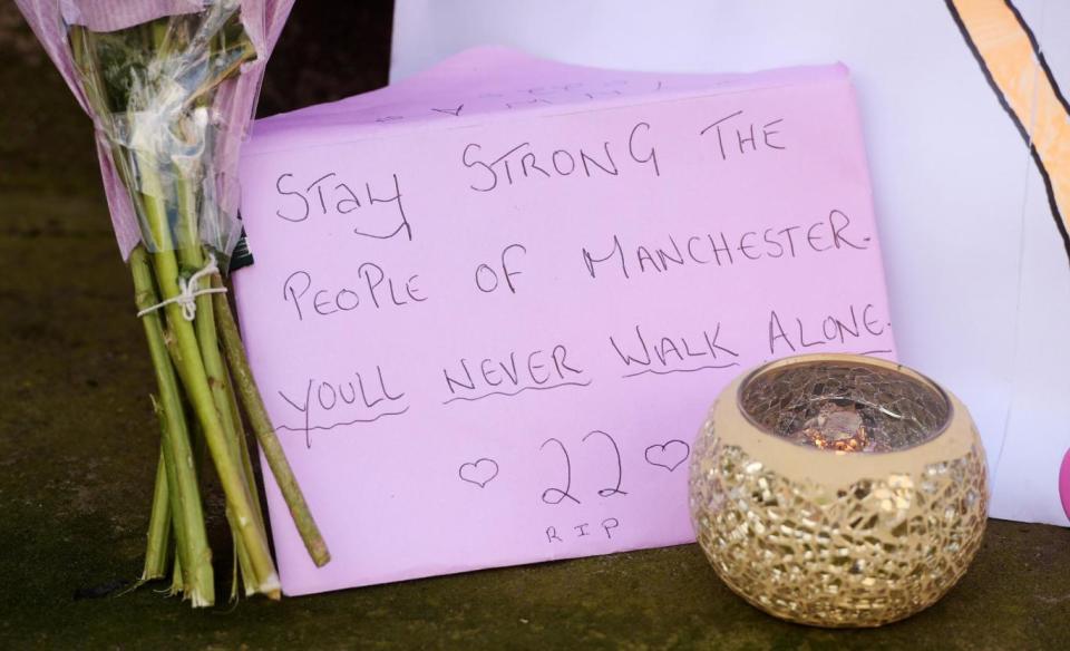 Tributes to the attack victims (Ben Birchall/PA )