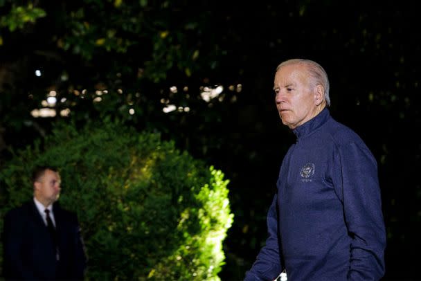 PHOTO: President Joe Biden walks to the White House after landing on the South Lawn aboard Marine One, May 21, 2023 in Washington, DC. (Samuel Corum/Getty Images)