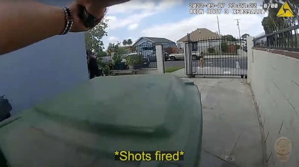 PHOTO: LAPD officers seen in a body-camera video taking cover on Sept. 17, 2022, and fatally shooting a man who emerged from the house wielding what appeared to be an assault rifle, but later was determined to be an airsoft rifle. (Los Angeles Police Department)