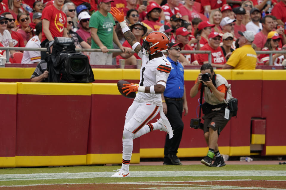 Cleveland Browns safety Juan Thornhill celebrates after intercepting a pass and running it back for a touchdown during the first half of an NFL preseason football game against the Kansas City Chiefs Saturday, Aug. 26, 2023, in Kansas City, Mo. (AP Photo/Ed Zurga)