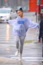 <p>Only Ari could look this adorable drenched in rain. Throw on some sweats and take inspo from her rainy day lewk!</p>