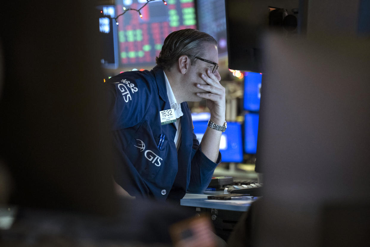 Traders work on the floor of the New York Stock Exchange (NYSE) during morning trading on January 3, 2024, in New York City. Wall Street stocks slumped to start Wednesday with all three major US indices in the red and key names such as Facebook parent Meta Platforms and Nvidia falling. (Photo by ANGELA WEISS / AFP) (Photo by ANGELA WEISS/AFP via Getty Images)