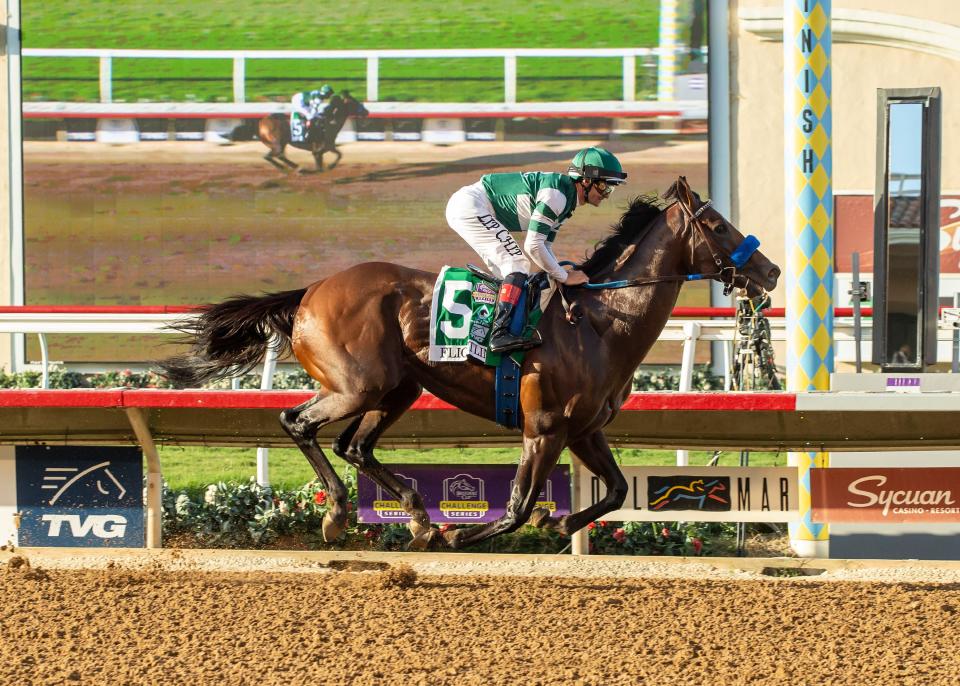 In this image provided by Benoit Photo, Flightline, with Flavien Prat aboard, wins the Grade I, $1,000,000 Pacific Classic horse race Saturday, Sept. 3, 2022, at Del Mar Thoroughbred Club in Del Mar, Calif. (Benoit Photo via AP)