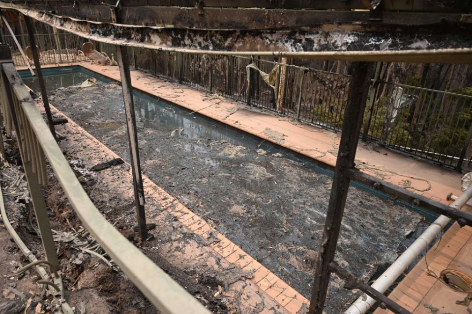 A swimming pool in the remains of a house, near Batemans Bay, destroyed by bushfires.