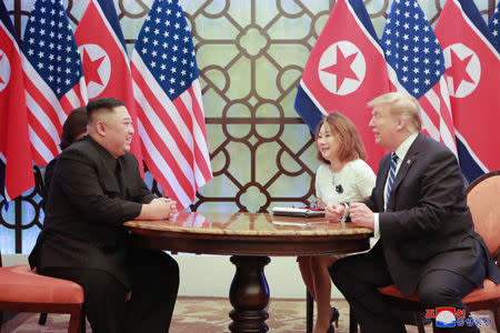 North Korea's leader Kim Jong Un and U.S. President Donald Trump talk during the second North Korea-U.S. summit in Hanoi, Vietnam, in this photo released on March 1, 2019 by North Korea's Korean Central News Agency (KCNA). KCNA via REUTERS