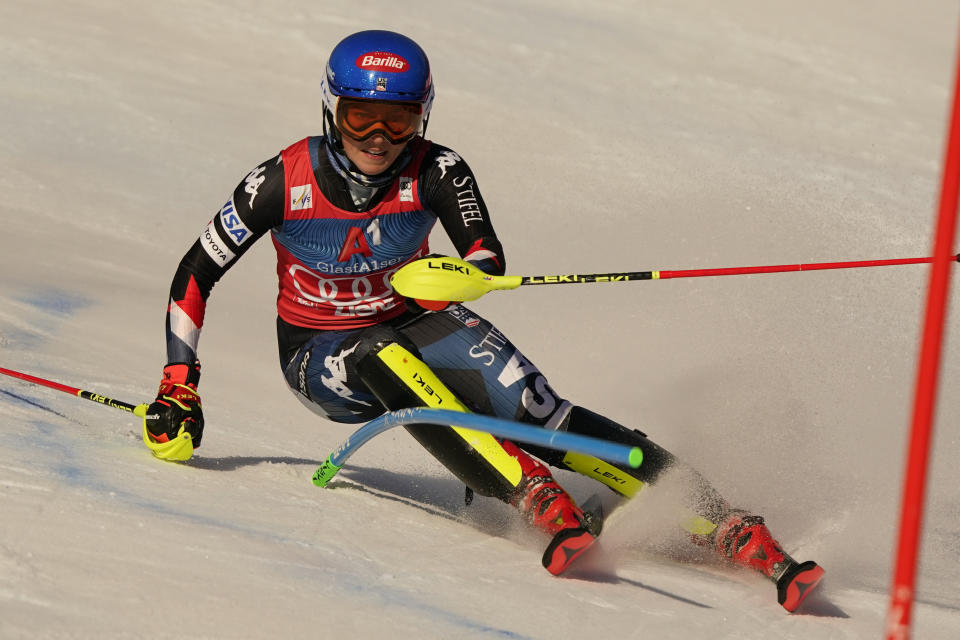 United States' Mikaela Shiffrin speeds down the course during an alpine ski, women's World Cup slalom race, in Lienz, Austria, Friday, Dec. 29, 2023. (AP Photo/Piermarco Tacca)