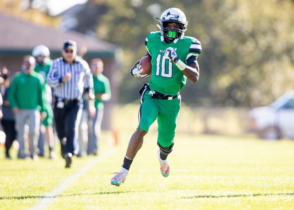 Athens’ Ja’Kyan Shanklin (10) streaks down the sideline on a rush against Sesser-Valier In the first half during the second round of the Class 1A playoffs at Knoles-Thompson Field in Athens, Ill., Saturday, November 6, 2021. [Justin L. Fowler/The State Journal-Register] 