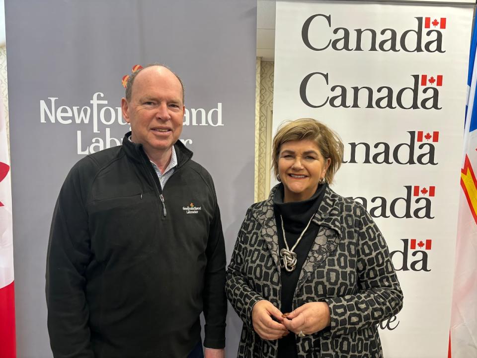 N.L. Transportation and Infrastructure Minister John Abbott, left, and Liberal MP Gudie Hutchings say the funding comes as climate change continues to impact coastline in the province.