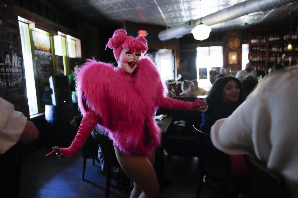 Sweet Pickles performs during the "Mimosas & Heels Drag Brunch" at the Public House, Sunday, March 5, 2023, in Norfolk, Va. The drag bunch was hosted by Harpy Daniels and Javon Love. (AP Photo/Carolyn Kaster)