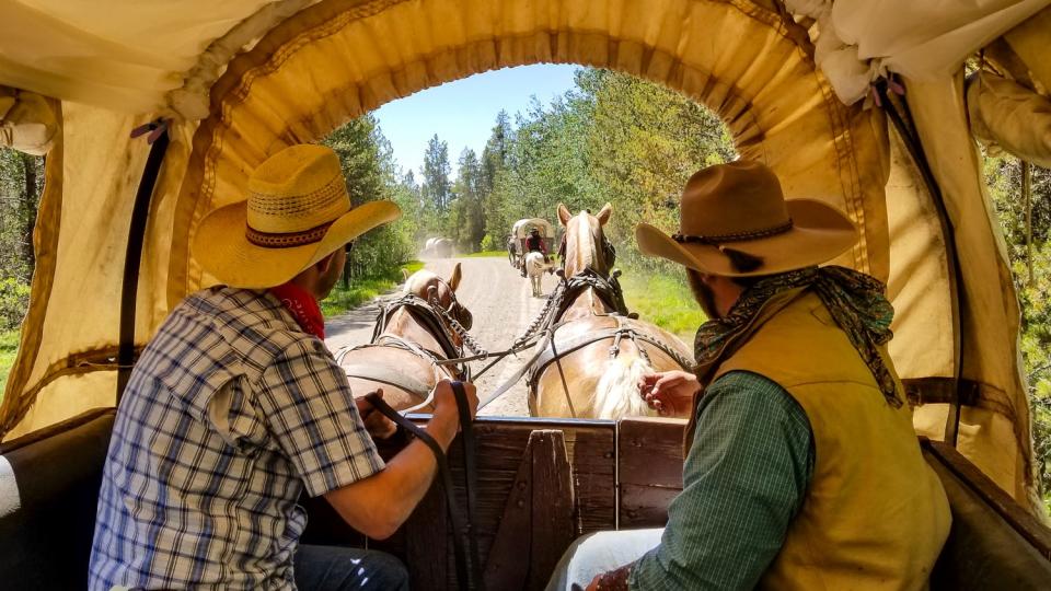 Teton Wagon Train & Horse Adventure lets glampers take their adventure on the road with a covered wagon journey from camp to camp.