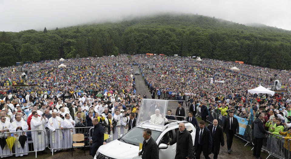 Pope Francis arrives to celebrate Mass at the Marian shrine, in Sumuleu Ciuc, Romania, Saturday, June 1, 2019. Francis began a three-day pilgrimage to Romania on Friday that in many ways is completing the 1999 trip by St. John Paul II that marked the first-ever papal visit to a majority Orthodox country. (AP Photo/Andrew Medichini)