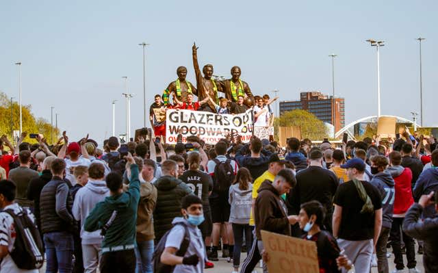 Manchester United fans protest against the club's owners