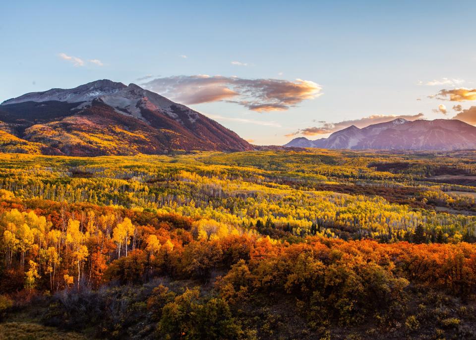 <p>Aspen may seem like a bit of an obvious choice—hello, mountains famously full of yellow leaves—but obvious isn’t always a bad thing. Plus, some of the city’s hotels are offering up some season-specific perks that make this fall a freshly great time to visit. </p> <p><a href="https://www.cntraveler.com/hotels/united-states/aspen/hotel-jerome--aspen?mbid=synd_yahoo_rss" rel="nofollow noopener" target="_blank" data-ylk="slk:Hotel Jerome;elm:context_link;itc:0;sec:content-canvas" class="link ">Hotel Jerome</a> can arrange outdoor adventures like fly fishing in the Roaring Fork River or paragliding over Aspen Mountain, and is also offering a special “<a href="https://aubergeresorts.com/hoteljerome/experiences/hike-colorados-most-iconic-peaks" rel="nofollow noopener" target="_blank" data-ylk="slk:Tour de 14ers;elm:context_link;itc:0;sec:content-canvas" class="link ">Tour de 14ers</a>” package, which is catered to those hoping to conquer one of Aspen’s mountains that reaches over 14,000 feet. You can choose between a three- and six-day program, both of which include boot camp training and guided hiking tours of the infamous peaks. True to our current climate, W Aspen & Sky Residences is offering a “<a href="https://fave.co/33SPqlk" rel="noopener" target="_blank" data-ylk="slk:Work, Play & Stay;elm:context_link;itc:0;sec:content-canvas" class="link ">Work, Play & Stay</a>” package which upgrades any booking to include a bevy of work-from-home amenities, including an adjustable laptop desk, bluetooth keyboard, and cocktails delivered to your room promptly at 5 p.m. to help you transition from work to relaxation, all for a flat rate of $650.</p> <p>For some of the best foliage views, stop by the Maroon Bells. Located about ten miles west of Aspen, the pair of mountains are some of the most photographed in the entire state. In fact, professional photographers are known to flock to the shores of Maroon Lake well before sunrise to nab that perfect fall shot. <em>—Caitlin Morton</em></p>