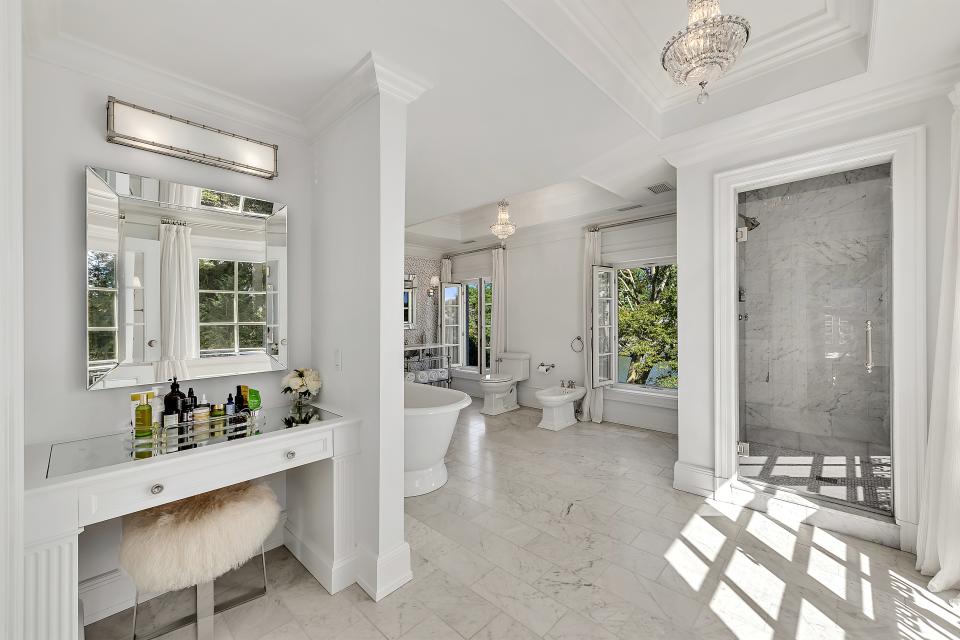 One of two cavernous master bathrooms.