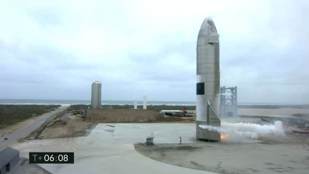 In this image from video made available by SpaceX, a Starship test vehicle sits on the ground after returning from a flight test in Boca Chica, Texas, on Wednesday.  (SpaceX/The Associated Press - image credit)