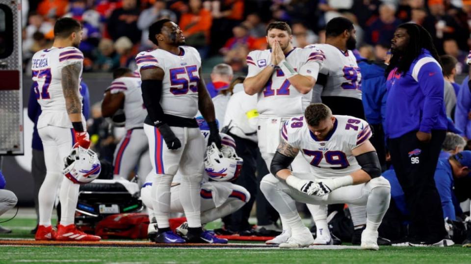 Buffalo Bills players react after teammate Damar Hamlin #3 was injured against the Cincinnati Bengals during the first quarter at Paycor Stadium on Jan. 2, 2023, in Cincinnati. (Photo by Kirk Irwin/Getty Images)