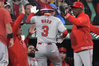 Los Angeles Angels' Taylor Ward (3) is congratulated after his two-run home run against the Boston Red Sox during the sixth inning of a baseball game Friday, April 12, 2024, in Boston. (AP Photo/Charles Krupa)