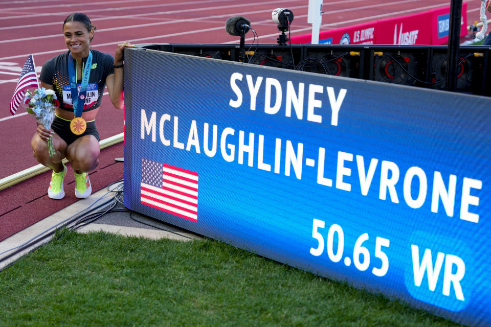 Sydney McLaughlin-Levrone poses for a photo after winning the women's 400-meter hurdles final during the U.S. Track and Field Olympic Team Trials, Sunday, June 30, 2024, in Eugene, Ore. (AP Photo/Charlie Neibergall)